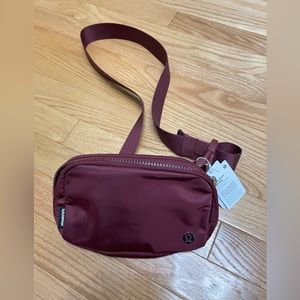 LULULEMON Everywhere Belt Bag in a beautiful Maroon red color